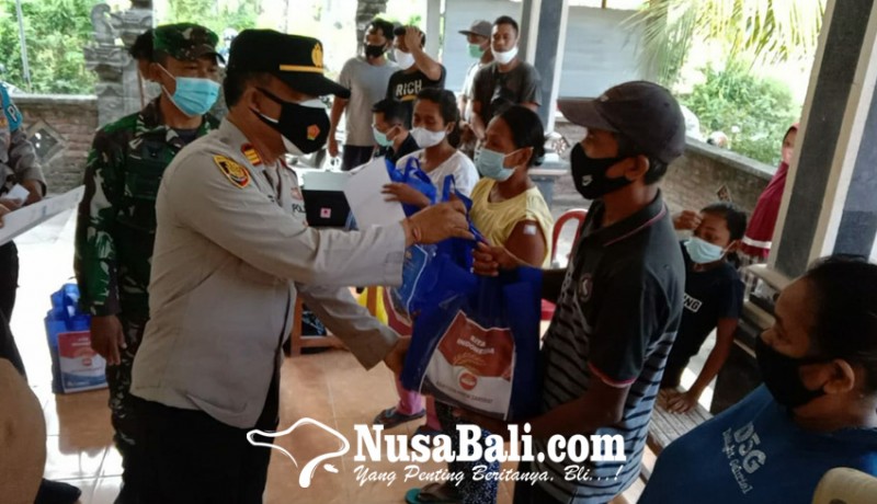 www.nusabali.com-tarik-minat-warga-divaksin-5-pendaftar-pertama-dihadiahi-sembako